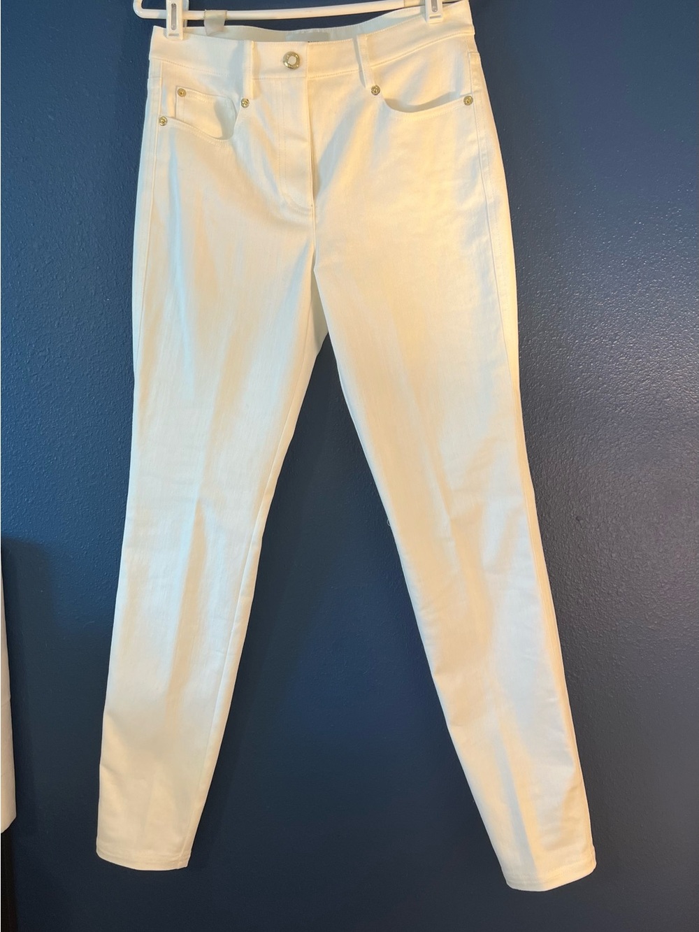 Bright white St. John White Skinny Jeans with Gold Hardware, size 4.